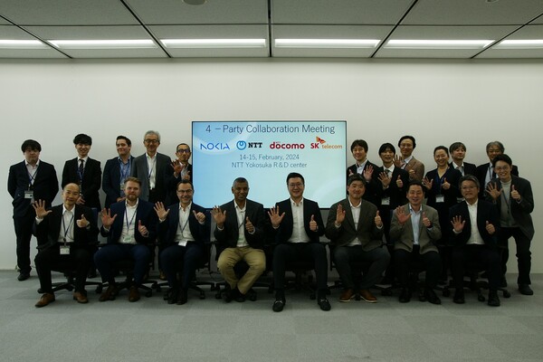 4개사 기술 관계자들이 지난 15일 일본 요코스카시 NTT R&D센터에서 진행된 기술 협력 회의에 참석한 모습 (제공=SK텔레콤)